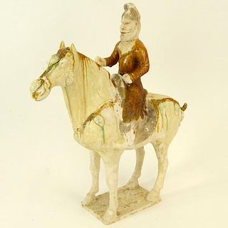 Chinese Tang Dynasty Sancai Glaze Pottery Horse and Rider. Provenance: The Shepps Collection, Palm Beach, Florida. Unsigned. Surface glaze losses othe