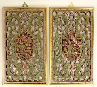 Pair of Vintage Chinese Deep Relief Carved Wood and Polychromed Panels. Age splits and wear. Measures 29-1/2" x 17". Shipping $110.00