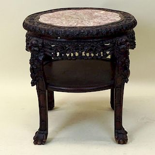 Antique Chinese Carved Hardwood Marble Top Pedestal Tables. Unsigned. Good condition. Measures 22-1/2" H x 17" dia. Shipping: Third Party.