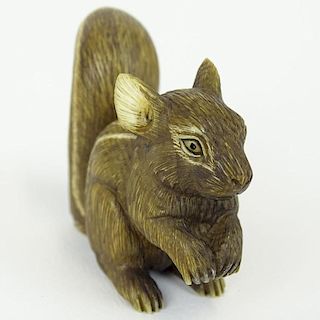 19th Century Japanese Carved Netsuke Depicting a Squirrel. Signed with artist's signature Gyoku Shi (1801-1868). Good condition. Measures 1-3/4" H. Th