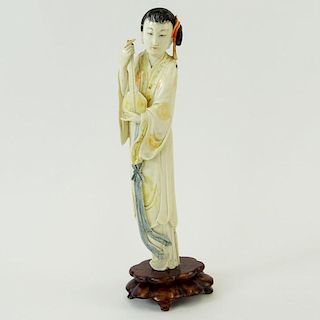 Chinese Carved Polychrome Ivory Maiden Figure on Carved Wood Base. Unsigned. Small losses / damages. Measures 10-1/4" H, 2-1/4" W. This item will only