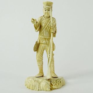 Japanese Carved Ivory Soldier Figure. Signed. Good condition. Measures 5" H, 2-1/2" W. This item will only be shipped domestically and was legally imp