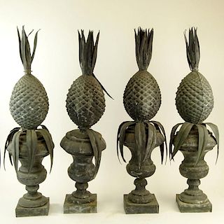Set of Four (4) 19/20th Century Zinc Pineapple Finials. Unsigned. 3 in good condition, one in as is condition. Measures 29-1/2" H x 8" W. Shipping: Th