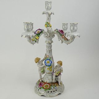 Vintage Von Schierholz Dresden Porcelain Figural 5 Light Candelabra. Decorated with Putti and Flowers. Signed. Typical minor losses to flower petals o