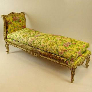 19th Century Italian carved, painted and parcel gilt chaise lounge. Unsigned. Rubbing, surface wear, upholstery as is. Measures 37-3/4" H x 78" L. Shi