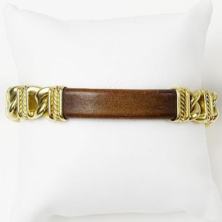 Men's David Yurman Heavy 18 Karat Yellow Gold and Brown Leather Bracelet. Signed 750. Very good condition. Measures 8-1/4 inches long. Approx. weight: