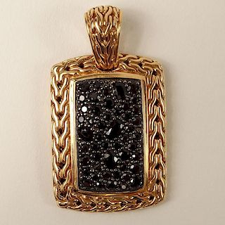Men's John Hardy 18 Karat Rose Gold and Black Sapphire Pendant. Signed. Very good condition. Measures 1-3/4 inches long and 1 inch wide. Approx. weigh