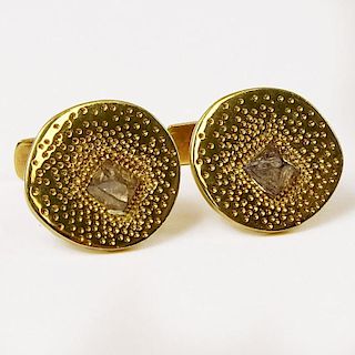 Pair of Men's DeBeers 18 Karat Yellow Gold and Diamond Cufflinks. Signed and Numbered A31881. Very good condition. Measure 5/8 inch diameter. Approx. 
