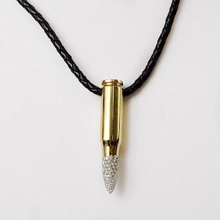 18 Karat Yellow AK-47 Bullet Pendant with 2.0 Carat Pave Set Round Cut Diamond Tip and with Braided Leather Necklace. Diamonds F-G color, VS1 clarity.