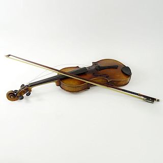 Antique Violin and Bow In Case. Unsigned. "AS IS" condition. Wear, Losses loose parts. Measures 23-1/2" Length. Shipping $85.00