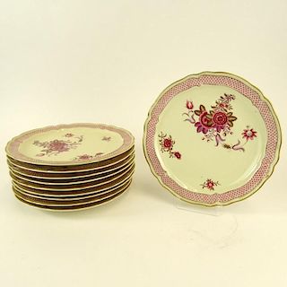 Ten (10) Mid 20th Century French Bernardaud & Cie Limoges Porcelain Dinner Plates in the "Nankin" Pattern. Signed. Minor rubbing to gilt decoration ot
