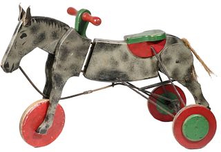 VINTAGE ARTICULATED HORSE RIDING TOY