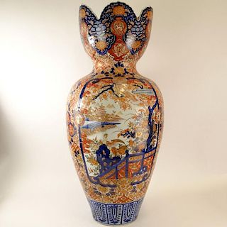 Large 19/20th Century Japanese Imari Porcelain Vase. Unsigned. Old restoration to top rim or in good condition. Measures 36" H x 15" W. Shipping: Thir