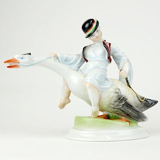 Herend Porcelain Figurine "Boy Riding Goose" Signed with blue Herend backstamp. Good condition. Measures 8" H. Shipping $65.00