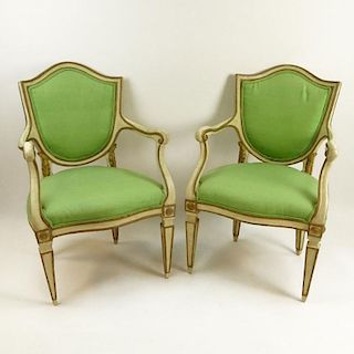 Pair of 19th Century Italian Painted and Parcel Gilt Shield Back Open Arm Chairs. Unsigned. Rubbing, surface wear, minor wood loss. Measures 36" H x 2