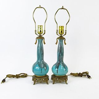 Pair of Circa 1920's Bronze Mounted Porcelain Lamps. The turquoise ground and cobalt drip glaze porcelain vases possibly Chinese. No visible marks to 