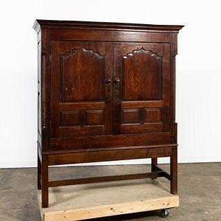 ENGLISH OAK TWO-DOOR CABINET ON STAND