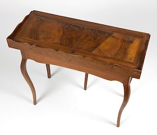 A French Provincial flip-top game table