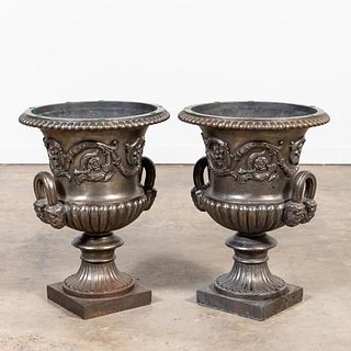 PAIR OF NEOCLASSICAL-STYLE CAST IRON PLANTERS