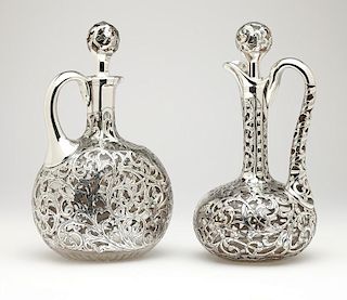2 American .999 silver-overlaid clear glass ewers