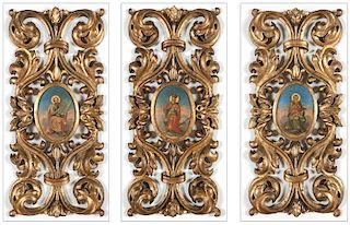 Three carved giltwood and painted icon panels