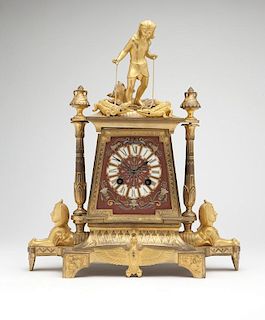 French Egyptian-revival gilt-bronze mantel clock