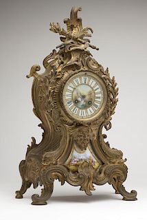 A French gilt-bronze Louis XV-style mantel clock