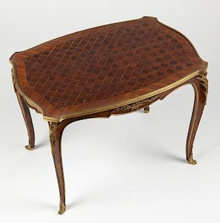 A parquetry Louis XVI-style tea table
