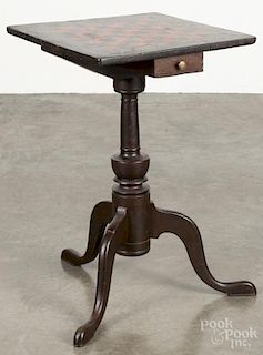 Painted candlestand, 19th c., retaining a later checkerboard top and brown surface, 25'' h.