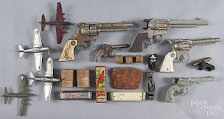 Miscellaneous toys, 20th c., to include cap guns, a Hop along Cassidy pocket knife