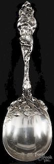 Reed and Barton sterling silver floral repoussé serving spoon, 9 3/4'' l., 6.45 ozt.