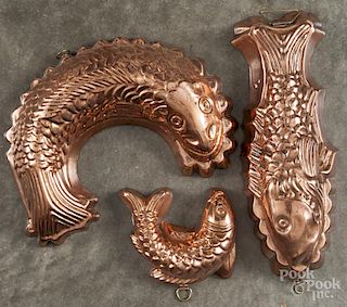 Three copper fish molds, 5 1/2'' l., 12 1/4'' l., and 11 1/4'' l.