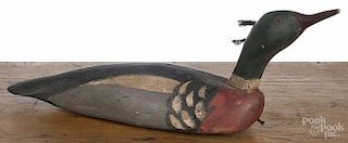 Carved and painted merganser duck decoy, 20th c., stamped MMO, 21 1/2'' l.