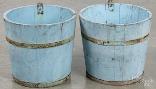 Two painted buckets in old blue paint, 11'' h. and 12 1/4'' h.