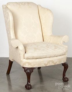 Kittinger Chippendale style mahogany wing chair.
