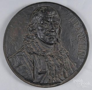 Large cast iron plaque of Benjamin Franklin, initialed WR verso, 21 1/4'' dia.