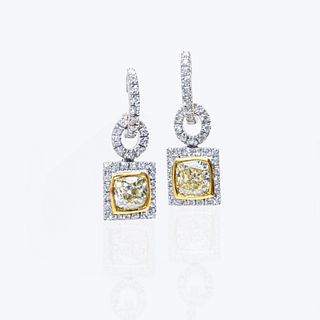 Pair of Fancy Yellow And White Diamond Earrings