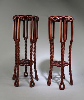 A Pair of Carved Wooden Tea Stands