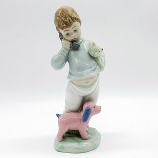 Boy on Phone with Puppets - Nao by Lladro Figurine