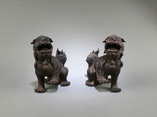 A Pair of Iron Foo Lion Display Figureines