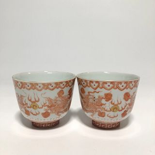 A Pair of Red Porcelin Cups. 'YongZheng' mark at base. Height: 7 cm diameter: 8.7cm