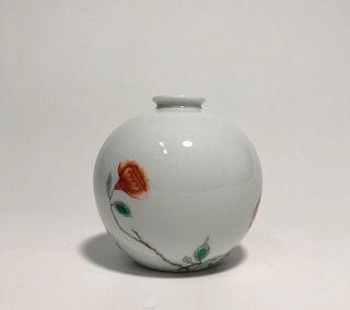 A Porcelain Jar. 'KangXi' mark at base. Height: 9" Diameter: 9.1"