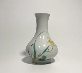 A Porcelain Vase. A four character mark is imprinted at the base. Height: 18.3cm