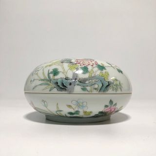 A Fencai Porcelain Round Container. 'QianLong' mark at base. Height: 7.5 cm Diameter: 14.2 cm