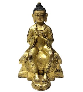 A Gilt Bronze Buddha Statue. Height: 22 cm Length: 13 cm Width: 11cm