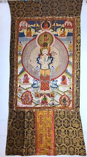 A Chinese Cloth Embroidered Thousand hands Guanyin Thangka. Dimension: 210 cm x 99 cm (overall) 121 cm x 76 cm (inner)
