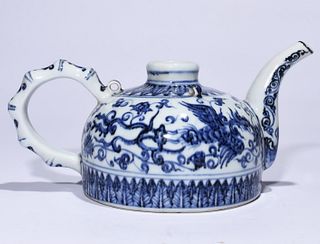 A Blue & White Porcelain Teapot. Height: 10.5 cm Length: 24 cm