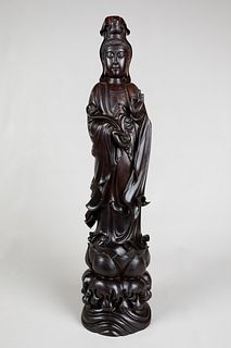 A Carved Zitan Standing Guanyin Statue