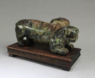 A Carved Mythical Beast Jadestone Figurine