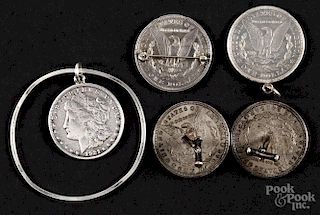 Morgan silver dollar jewelry set, to include a sterling bangle with a Morgan charm, a pendant
